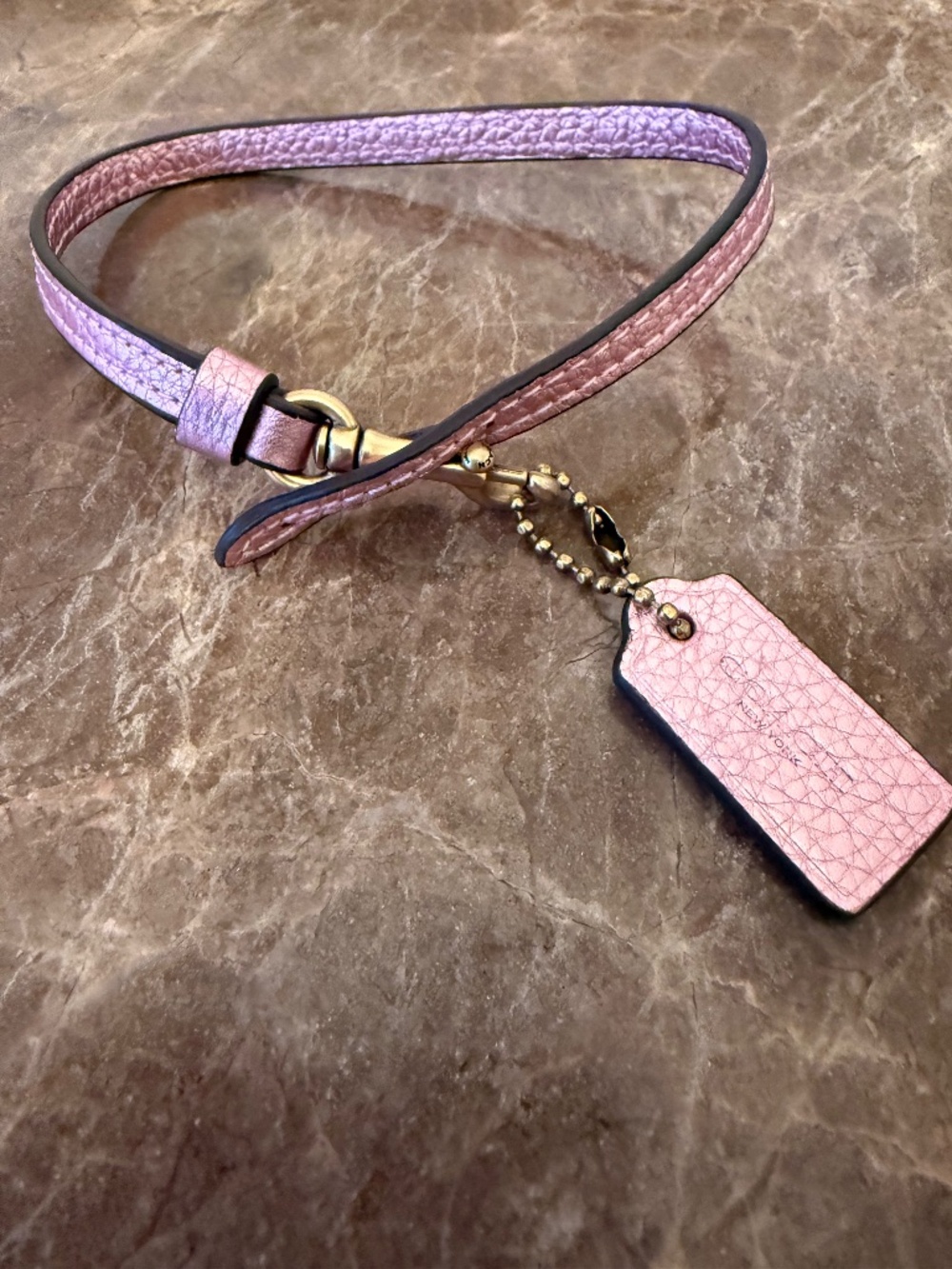 Coach Pebbled Leather Wrist Strap Loop Bag Charm with Hangtag Metallic Pink